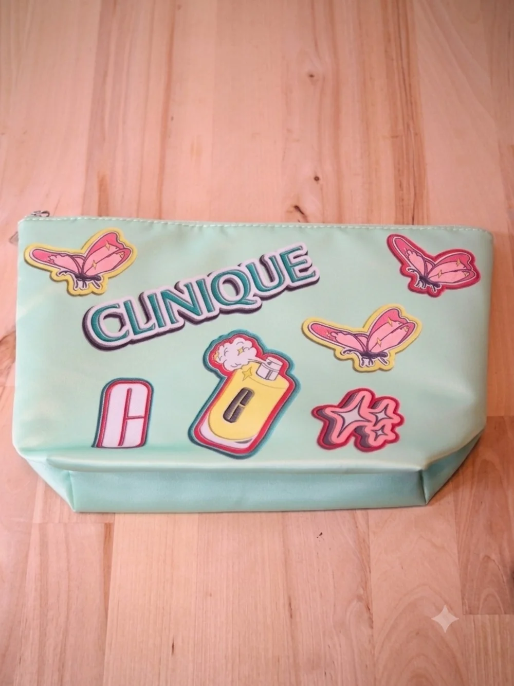Clinique Mint Green Cosmetic Pouch with Pink and Yellow Accents